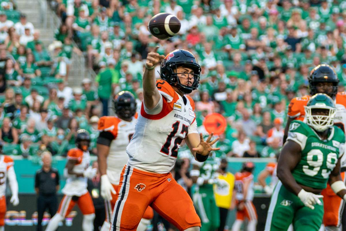 B.C. Lions quarterback Nathan Rourke throws against the Saskatchewan Roughriders during second-quarter CFL action in Regina on Friday night.