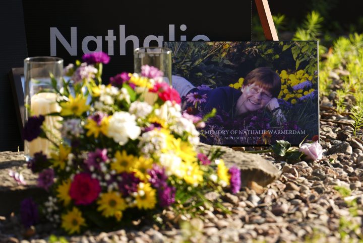 A picture of murder victim Nathalie Warmerdam, is displayed during a vigil at the Women's Monument in Petawawa, Ont., following the juries release of recommendations in the Borutski Inquest in Pembroke, Ont., on Tuesday, June 28, 2022. 