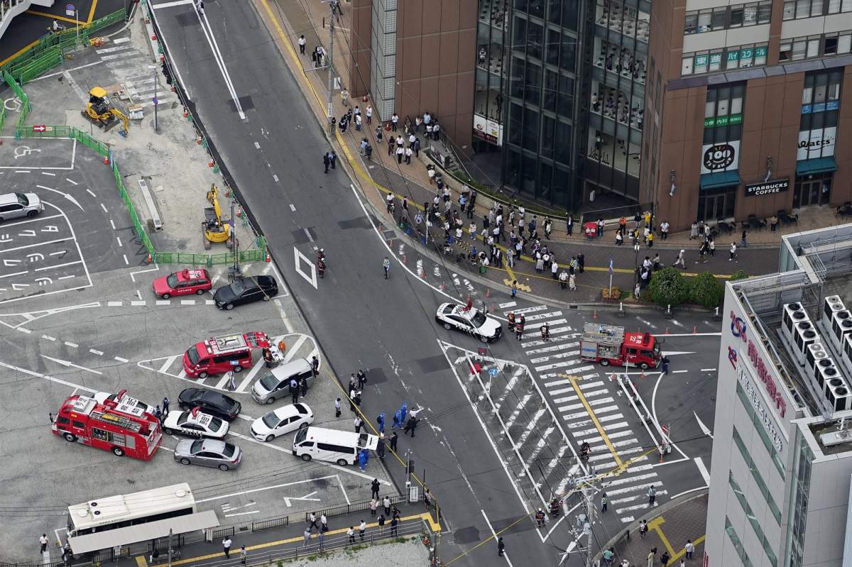 This aerial photo shows the scene of gunshots in Nara, western Japan Friday, July 8, 2022. Japanâ€™s former Prime Minister Shinzo Abe was in heart failure after apparently being shot during a campaign speech Friday in western Japan, NHK public television said Friday. (Kyodo News via AP)(Kyodo News via AP)