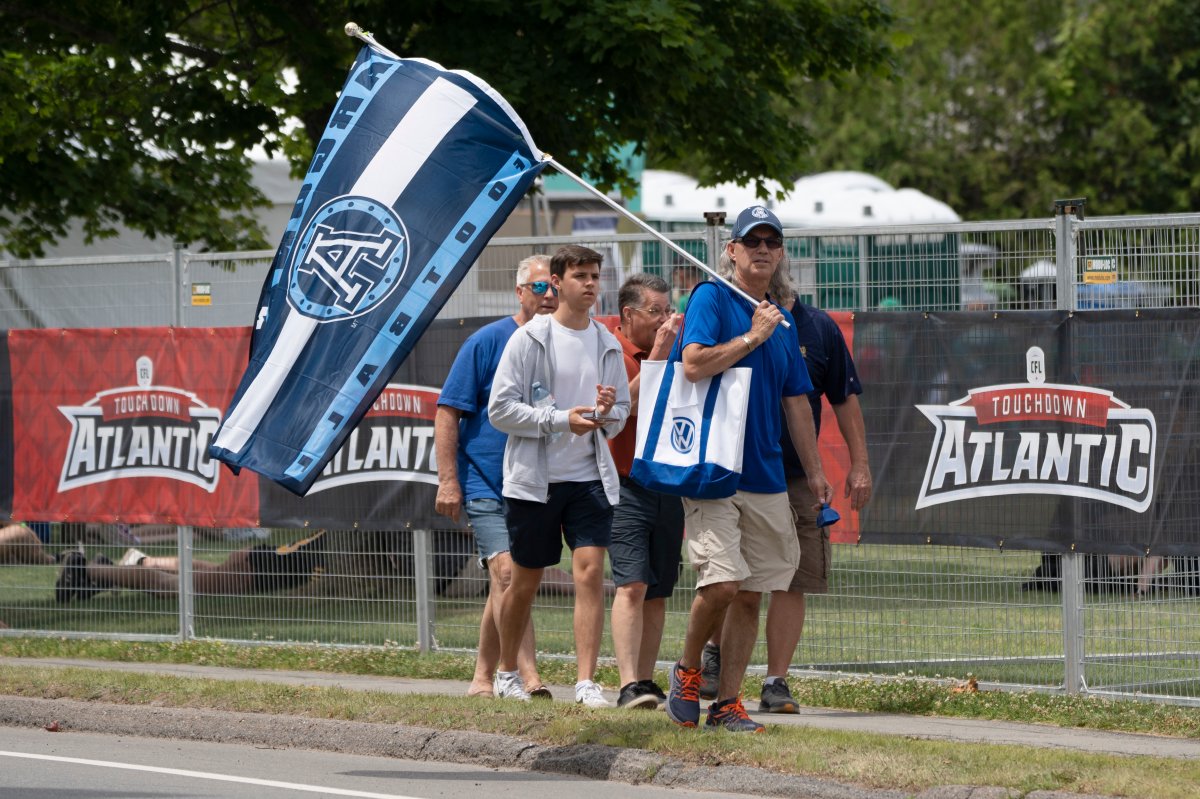 Toronto Argonauts fans make their way to CFL Touchdown Atlantic game between the Toronto Argonauts and the Saskatchewan Roughriders at Acadia University in Wolfville, N.S., Saturday, July 16, 2022. THE CANADIAN PRESS/Darren Calabrese