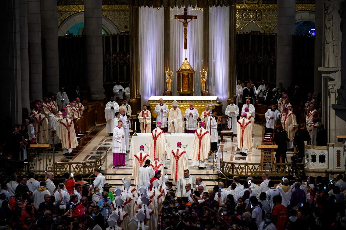 Pope Francis presides over a mass at the National Shrine of Saint Anne de Beaupre, Thursday, July 28, 2022, in Saint Anne de Beaupre, Quebec. (AP Photo/John Locher)