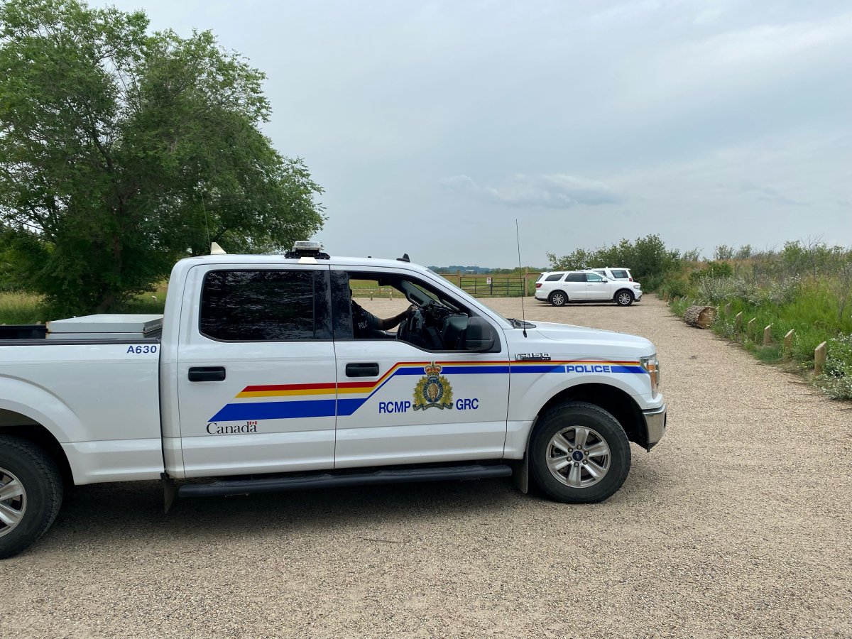 RCMP and Saskatoon Police search along South Saskatchewan River for Dawn Walker and her son.