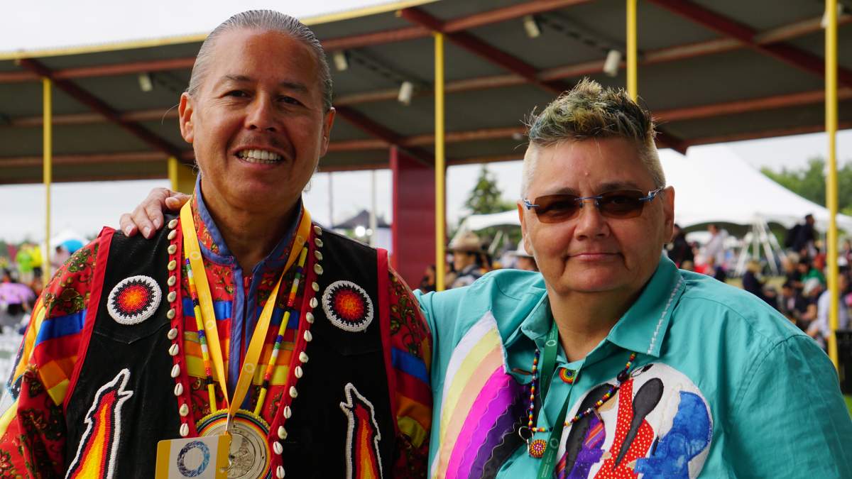 Pixie Wells, interim president of the Fraser Valley Métis Association stands with a new friend, Larron Northwest of the Samson Cree Nation, in Maskwacis, Alta. on Mon. July 25, 2022.