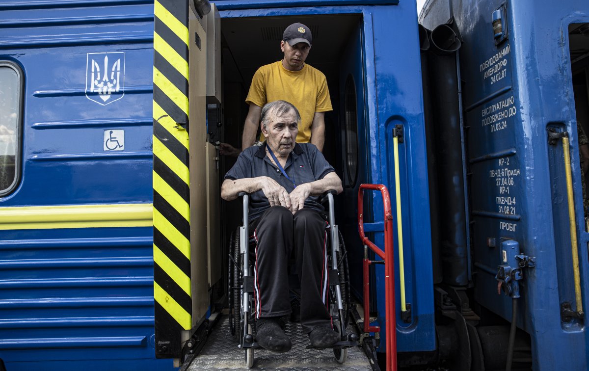 Civilians, evacuated from the Donetsk region, arrive at Pokrovsk train station to be sent to safe zones, in Pokrovsk, Donetsk Oblast, Ukraine on July 27, 2022.