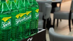 Bottles of Sprite soft drink by Coca-Cola Company are seen in a store.