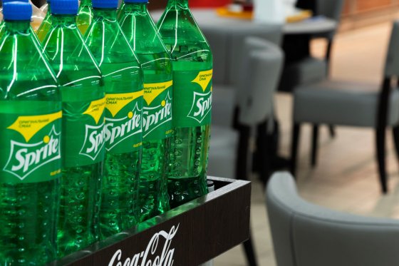 Bottles of Sprite soft drink by Coca-Cola Company are seen in a store.
