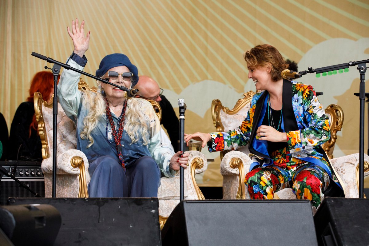 Brandi Carlile introduces Joni Mitchell for a special Joni Jam at the 2022 Newport Folk Festival at Fort Adams State Park on July 24, 2022.