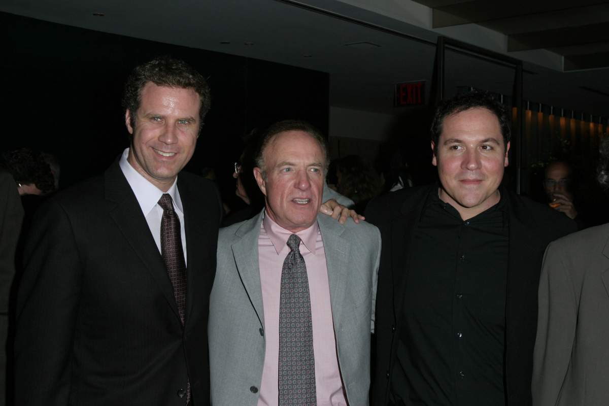 Will Ferrell, James Caan and Jon Favreau during New York premiere of “Elf”.
