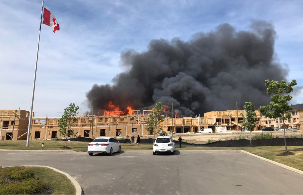 Fire crews battling a large structure fire on Hamilton's Mountain near Rymal Road East and the Upper Red Hill Valley Parkway on July 11, 2022.