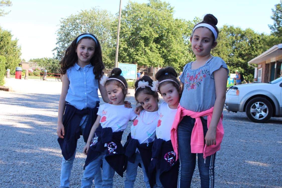 Nader Alrawi wondered how he could encourage his five young daughters to 'reconnect with their culture' after he noticed they were speaking more English than Arabic in their home. From left: Raghad Alrawi, 9, Rand Alrawi, 5, Rima Alrawi, 5, Lamar Alrawi, 5, and Sara Alrawi, 10.