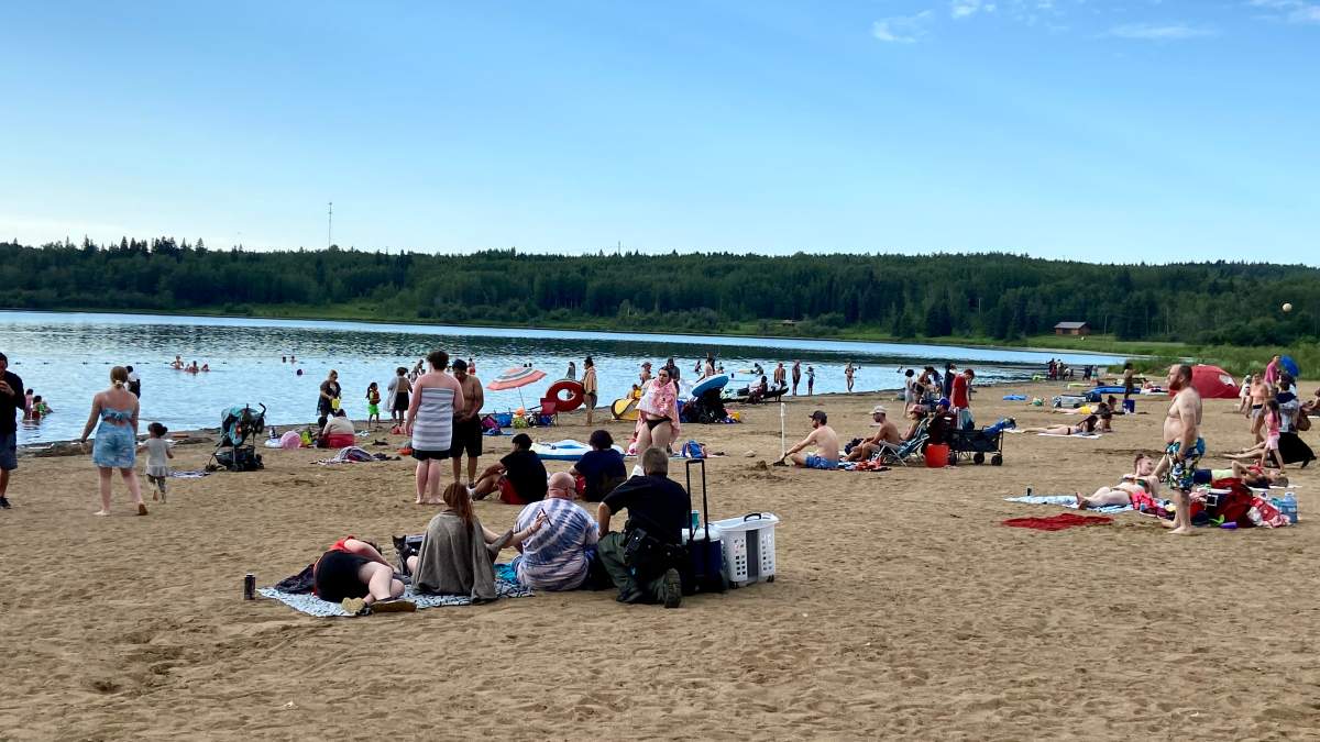 Beachgoers at Wabamun Lake