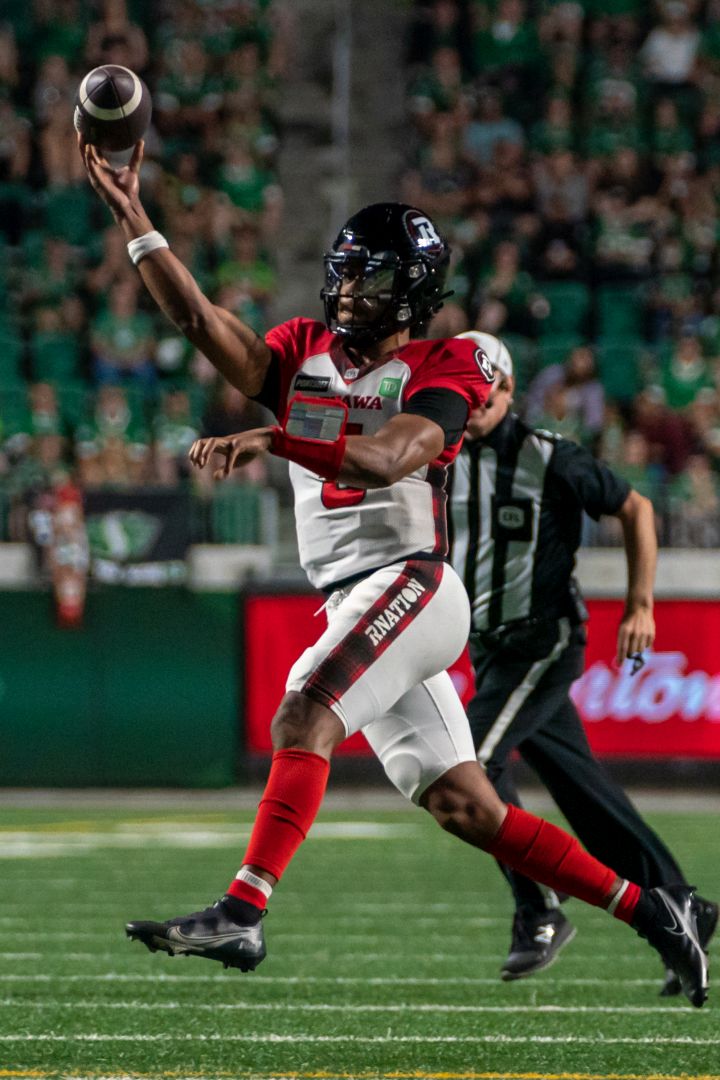 Ottawa Redblacks quarterback Jeremiah Masoli (8) throws the football against the Saskatchewan Roughriders during second half of CFL football action in Regina, Friday, July 8, 2022.