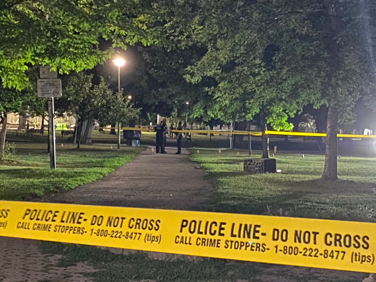Police tape surrounds the scene of a stabbing near Dundas and Bathurst streets on July 19, 2022.