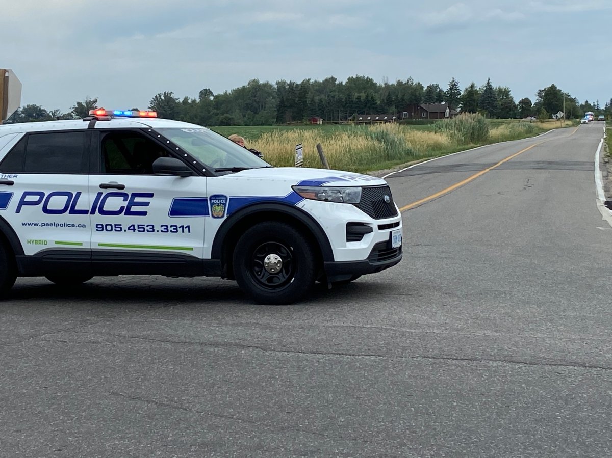 Police on scene in the area of Wanless Drive and Winston Churchill on July 20, 2022.