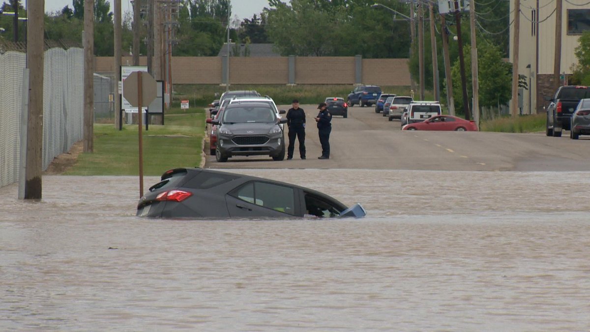 Vehicle submerged as it tried to drive through flooded area.