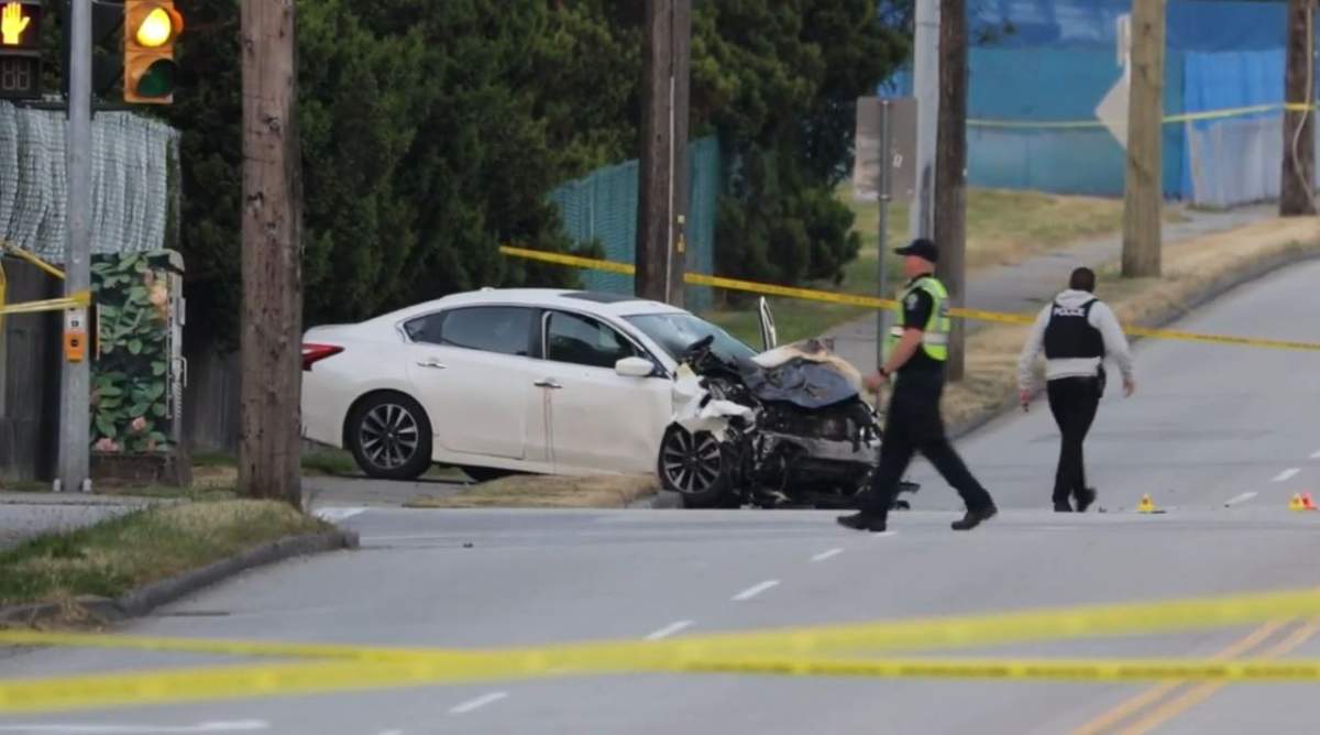 A white sedan had its entire front end destroyed in the crash.