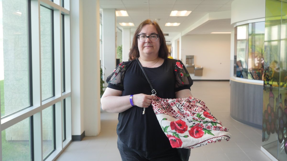 Natalia Moroz holding a bag that she got along