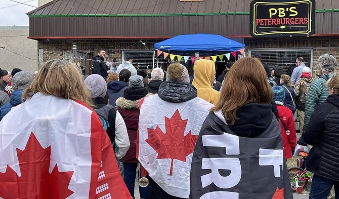 One of a number of anti-mandate rallies held outside PB's Peterburgers restaurant in Peterborough, Ont.