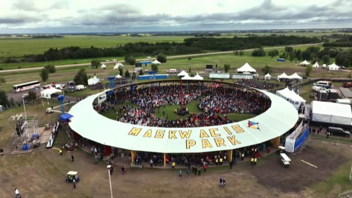 People gather in Maskwacis, Alta., Monday, July 25, 2022 for Pope Francis' visit to the region.