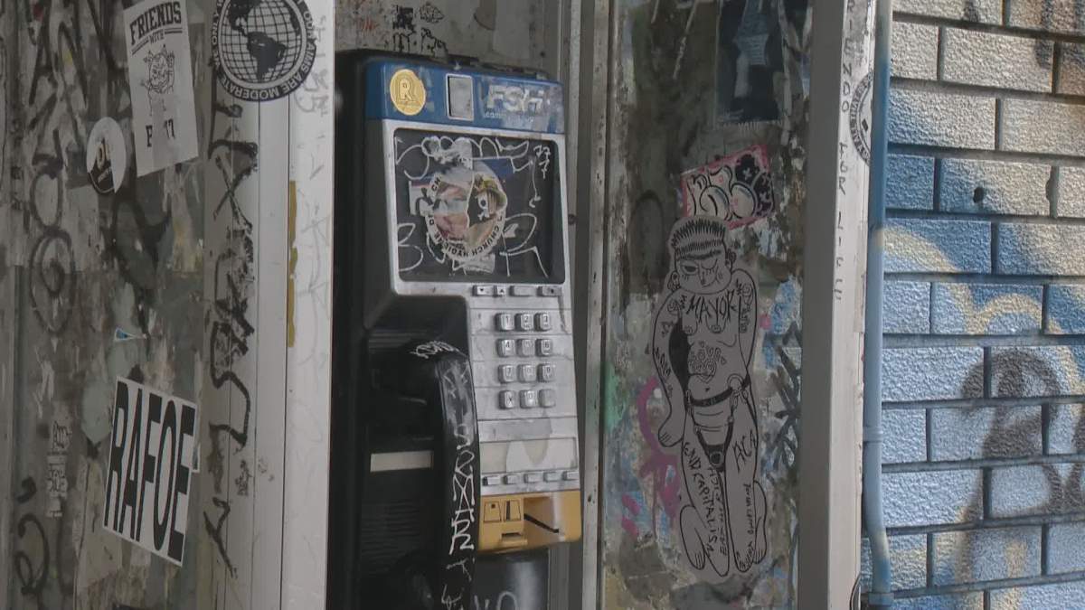 An FSH payphone outside the Hasty Market on Main Street at 16th Avenue on Sat. July 9, 2022.