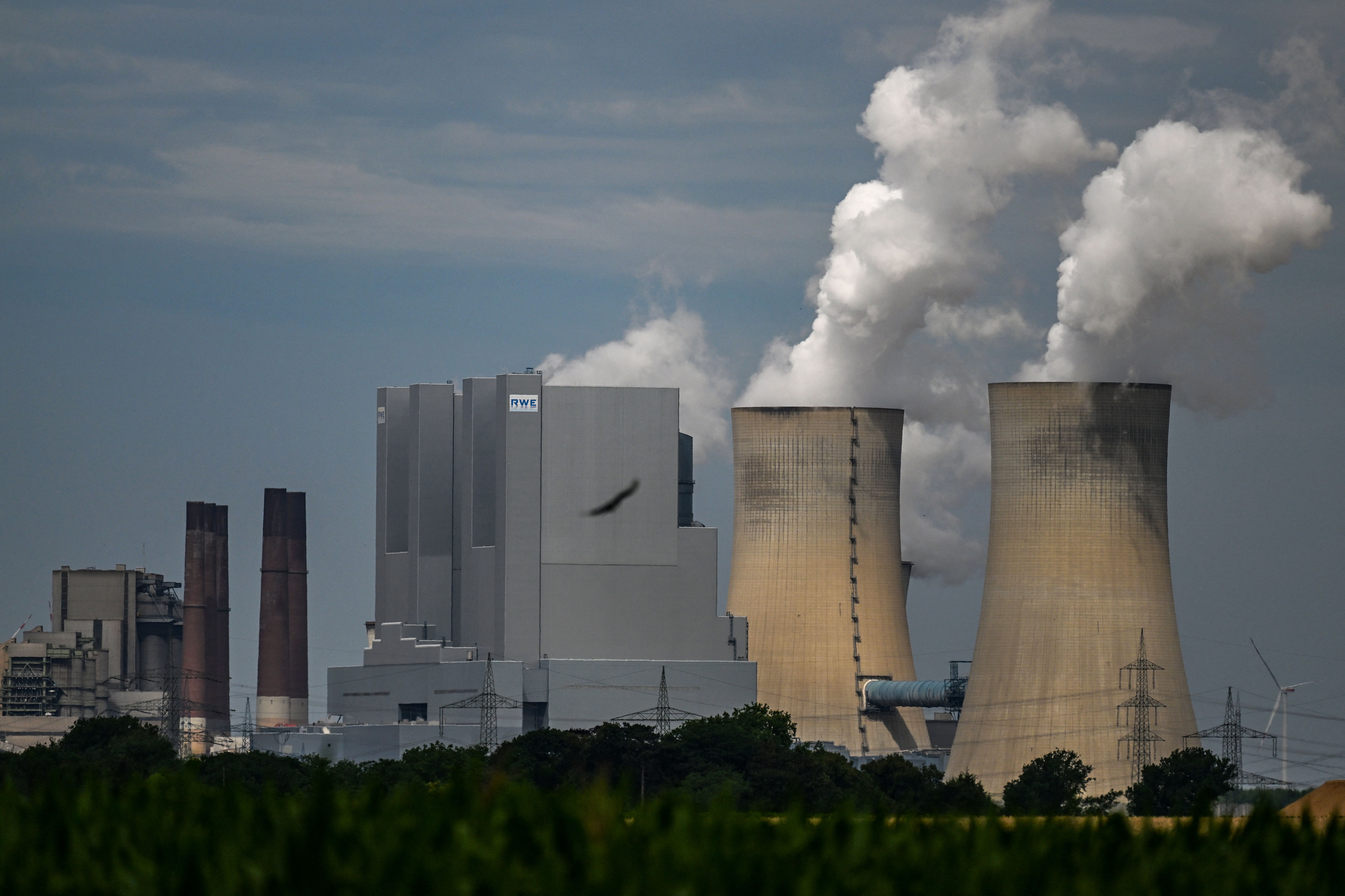 The coal-fired power plant operated by German energy supplier RWE is pictured in Neurath, western Germany, on July 13, 2022. In response to a squeeze of Russian gas supplies, Germany has reactivated mothballed coal power plants to take the burden off gas.