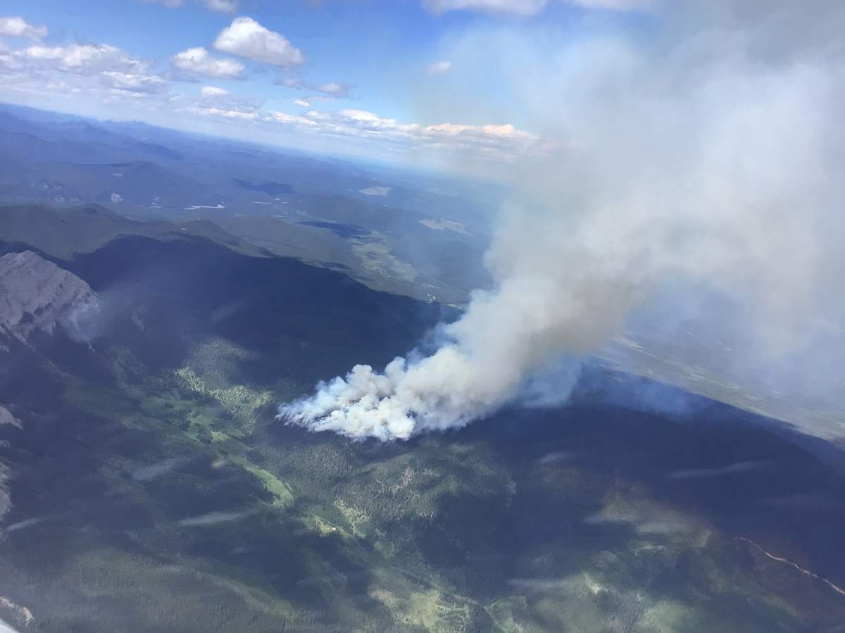 A photo of a wildfire burning northwest of Nordegg, Alta., on July 20, 2022.