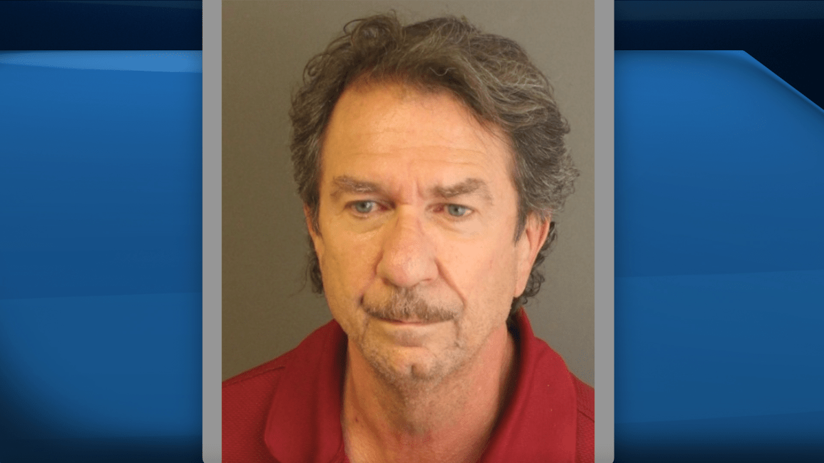 John Lindsay Bayer, 68, of London, was charged with two counts of indecent exposure to a person under 16 years of age.