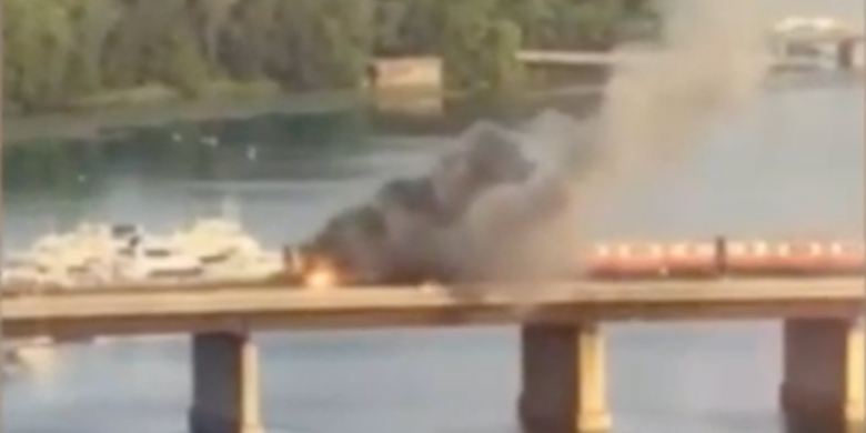 Train bound for Boston catches fire, passengers flee from windows, leap into river