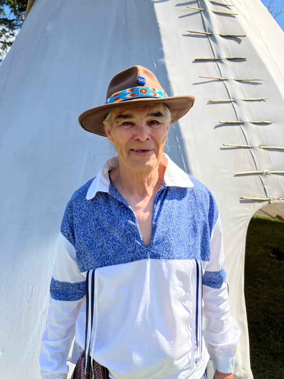 Michif speaker and Métis boarding school survivor Tom McCallum, White Standing Buffalo, is seen at the Lac St. Anne pilgrimage site in Alberta on July 26, 2022. Pope Francis joined survivors, elders, knowledge keepers, community members and members of the Catholic Church in a historic reconciliation ceremony there as part of his "penitential" tour of Canada.