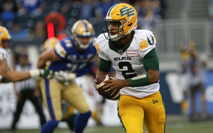 Edmonton Elks quarterback Tre Ford (2) looks downfield  against the Winnipeg Blue Bombers during the first half of pre-season CFL action in Winnipeg, Friday, May 27, 2022. 