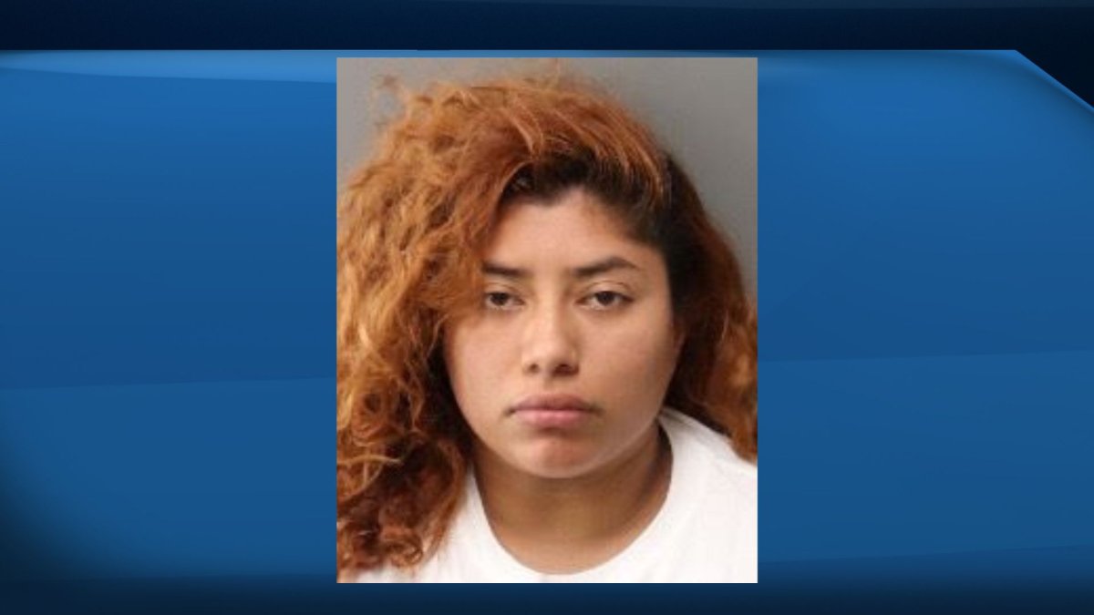Jesenea Miron's mugshot. Miron has been accused of impersonating a nurse and attempting to kidnap an infant from hospital.