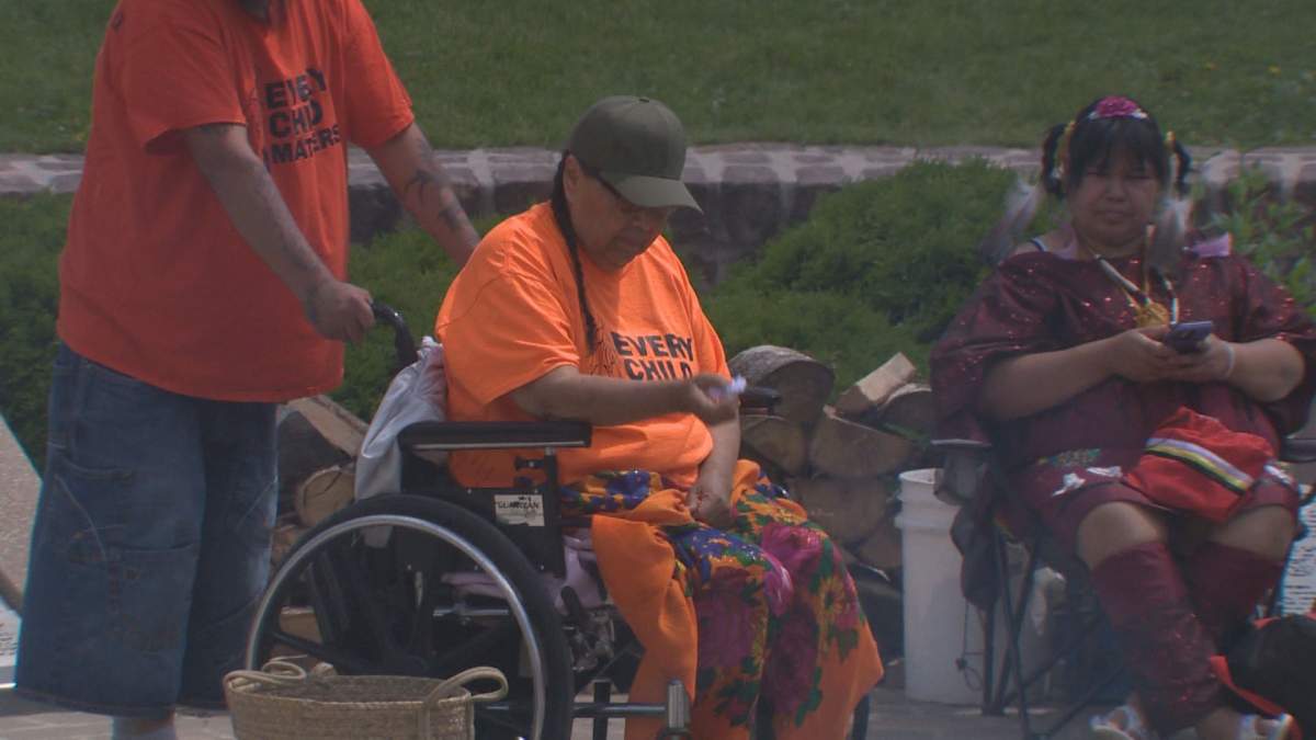 Christina Linklater, a residential school survivor at The Forks with her family on Canada Day.