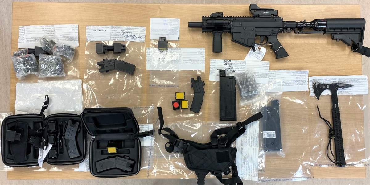Police seized conducted energy weapons and a paintball gun that had been modified to fire metal balls.