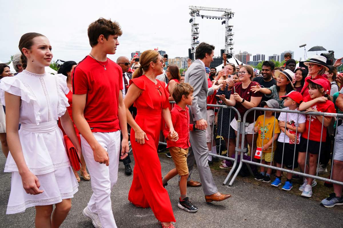 Prime Minister Justin Trudeau and his family greet people at the Canada Day concert.