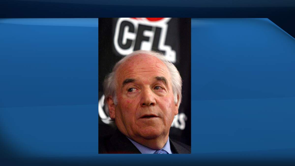 Then-Calgary Stampeders part-owner and former CFL commissioner Doug Mitchell speaks to the media during a news conference in Calgary, Alta., Wednesday, Jan. 12, 2005. Mitchell, a former CFL player who later served as league commissioner, has died. He was 83.