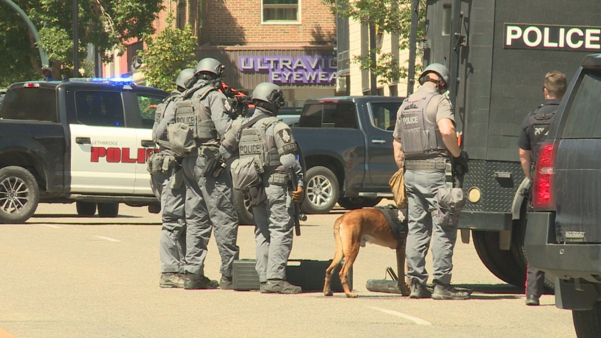 Police say a female employee of Lethbridge Legal Guidance was taken to hospital in life-threatening condition on July 14, 2022 after a hostage situation unfolded at a downtown office.