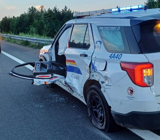 A woman from Tracadie was arrested for impaired driving after allegedly crashing into a police vehicle.
