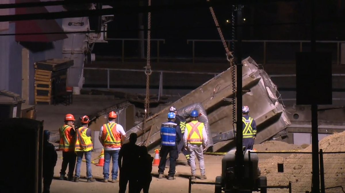 Rescue crews at the scene of a deadly roof collapse at an East Vancouver bakery in July, 2022. 