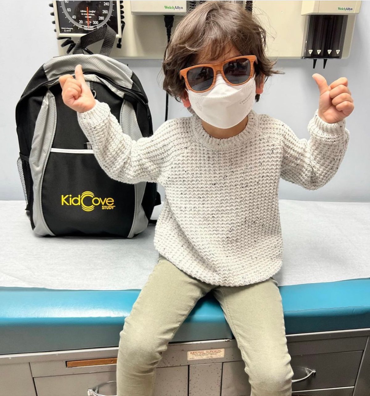 Sabina Vohra-Miller's son gives thumbs up after getting the COVID-19 vaccine as part of the clinical trials for the pediatric vaccine.