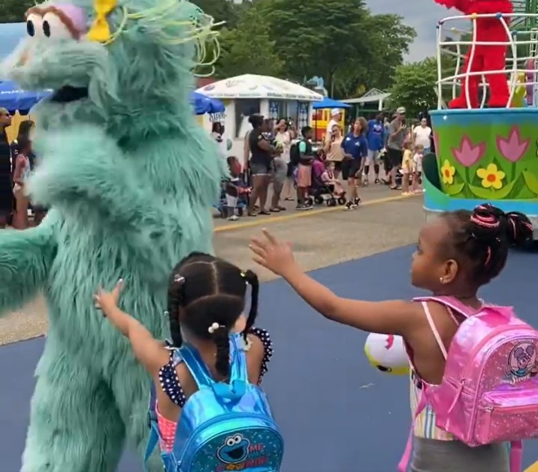 Two young Black girls appeared to be ignored by the character Rosita during a Sesame Place parade.