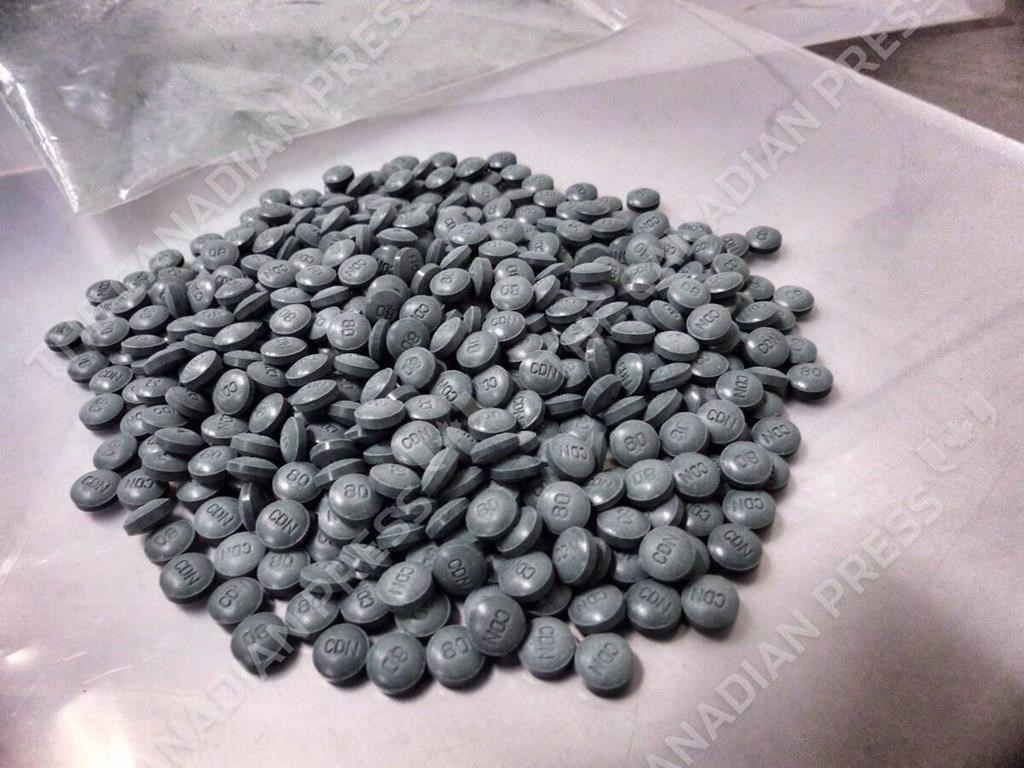 Fentanyl pills are shown in an undated police handout photo. THE CANADIAN PRESS/HO - Alberta Law Enforcement Response Teams.