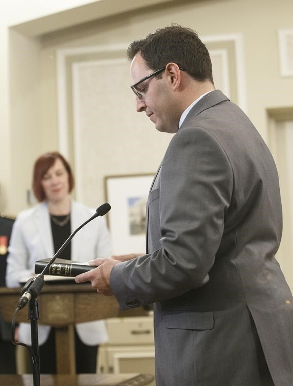 Demetrios Nicolaides, Minister of Advanced Education is sworn into office, in Edmonton on Tuesday April 30, 2019. The president of Alberta’s online Athabasca University says the province’s demand that the school relocate 500 staffers to the tiny rural town is so self-defeatingly backward it threatens to put the institution “on the path to ruin.” .