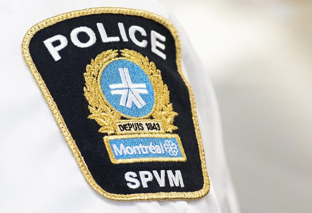Montreal police badge is shown at a news conference in Montreal, Thursday, August 4, 2022. 
