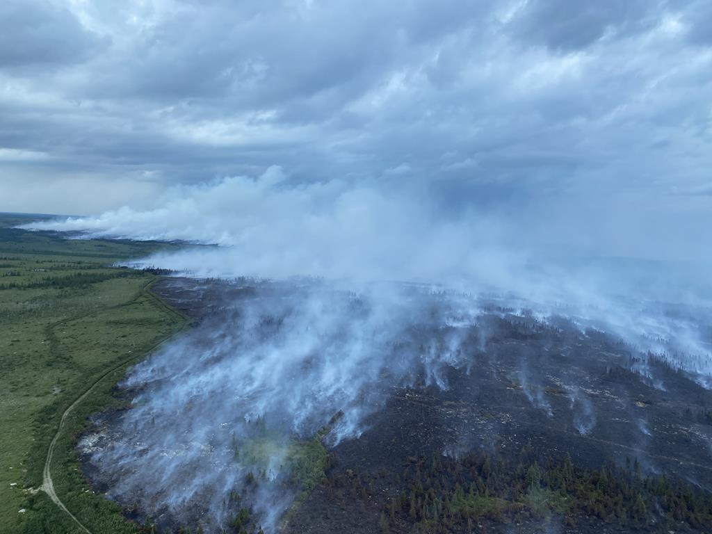 Smoke from a forest fire in central Newfoundland is shown in a Sunday, Aug.7, 2022, government handout photo.