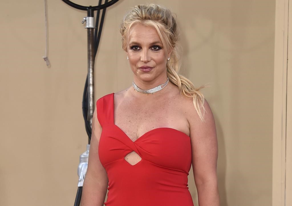 Britney Spears in a red dress as she arrives at the Los Angeles premiere of "Once Upon a Time in Hollywood," on July 22, 2019.