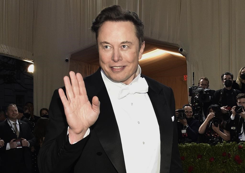 FILE - Elon Musk attends The Metropolitan Museum of Art's Costume Institute benefit gala on May 2, 2022, in New York. Musk caused a stir among Manchester United fans by tweeting that he was buying the English soccer team, then saying several hours later that it was just part of a long-running joke.