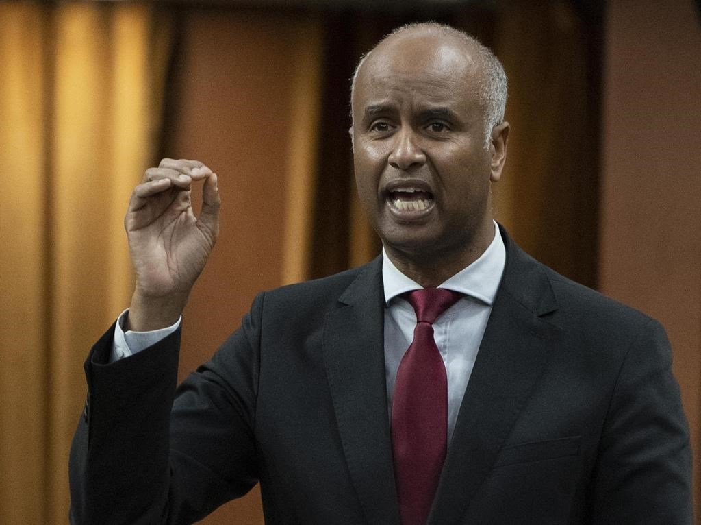 Housing and Diversity and Inclusion Minister Ahmed Hussen rises during Question Period, Thursday, June 2, 2022 in Ottawa. Hussen has asked Canadian Heritage to “look closely at the situation" after what he called “unacceptable behaviour” by Laith Marouf, a senior consultant involved in the government-funded project to combat racism in broadcasting.<div>THE CANADIAN PRESS/Adrian Wyld<br /></div>.