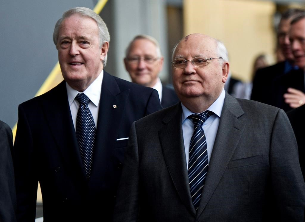 Former Soviet president Mikhail Gorbachev arrives to deliver a luncheon speech accompanied by former prime minister Brian Mulroney Friday, October 21, 2011 in Montreal. Gorbachev, the last leader of the Soviet Union, died Tuesday. He was 91.THE CANADIAN PRESS/Paul Chiasson