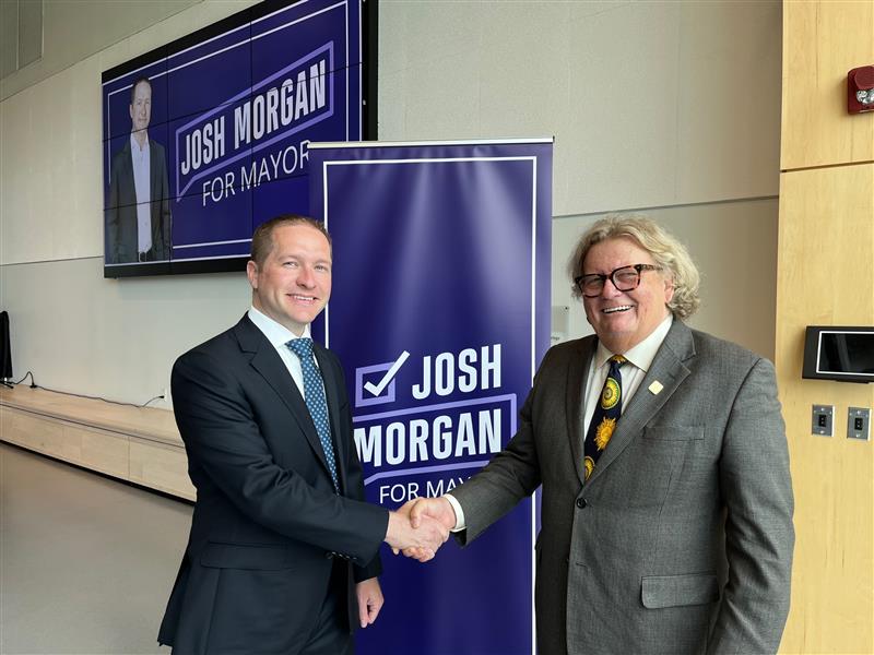 London Deputy Mayor Josh Morgan (left) shaking hands with London Mayor Ed Holder (right) after Holder endorsed Morgan's campaign for Mayor August 5, 2022.