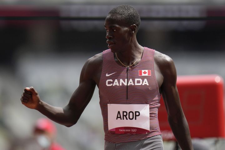 Marco Arop, of Canada, reacts after winning a heat in the men's 800-meter run at the 2020 Summer Olympics, Saturday, July 31, 2021, in Tokyo.